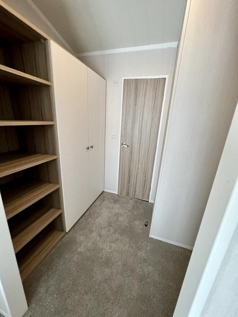 Main bedroom walk in wardrobe 
