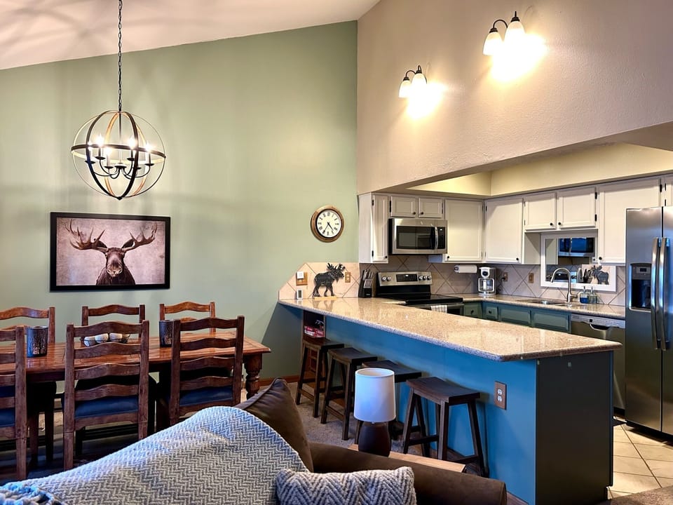 Newly updated kitchen with a full dining table.