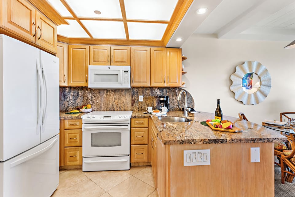 Prepare everything from quick breakfasts to gourmet dinners in the fully equipped kitchen, featuring ample counter space and all the essentials for your Maui getaway.
