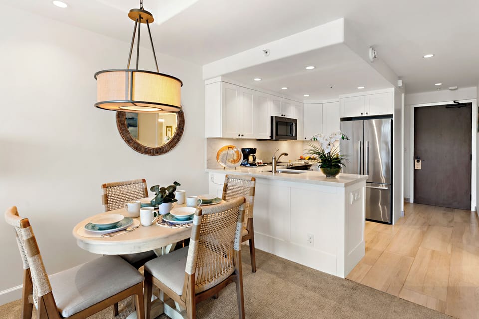 A bright, modern kitchen and dining space thoughtfully designed for relaxed island living and effortless entertaining.