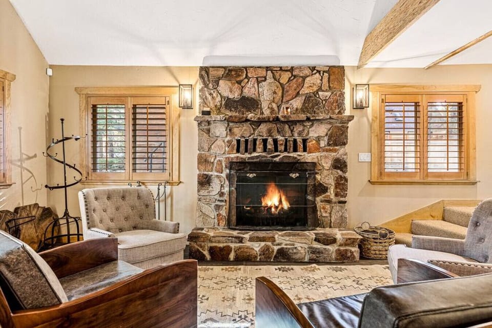 Cozy up with the entire crew and warm up by the a large stone fireplace in the living room.