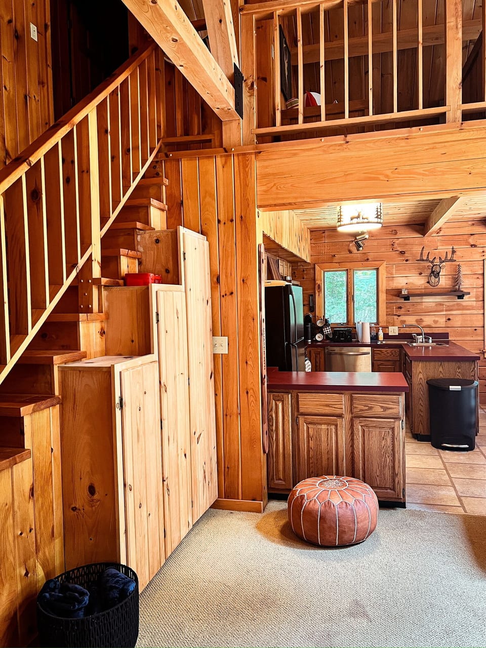 Enjoy the open-concept design where the living room flows seamlessly into the kitchen—perfect for gathering, relaxing, and staying connected.