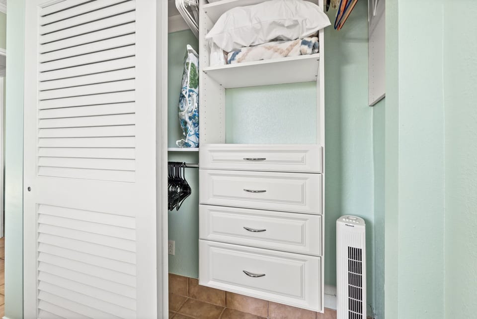 Bedroom closet for guests use, luggage rack for easy unpacking, 2 standing fans