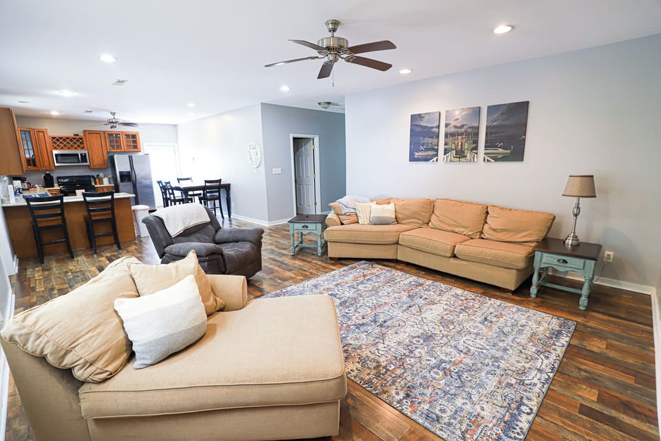 Living room looking into open floor plan kitchen