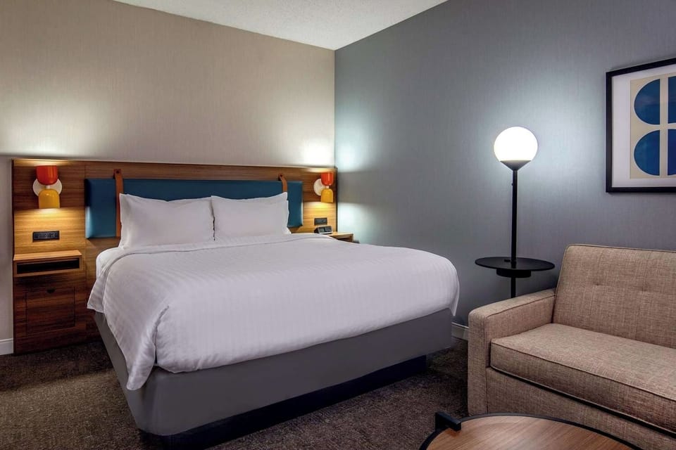 Drift off fast in a cozy bed with warm lighting.