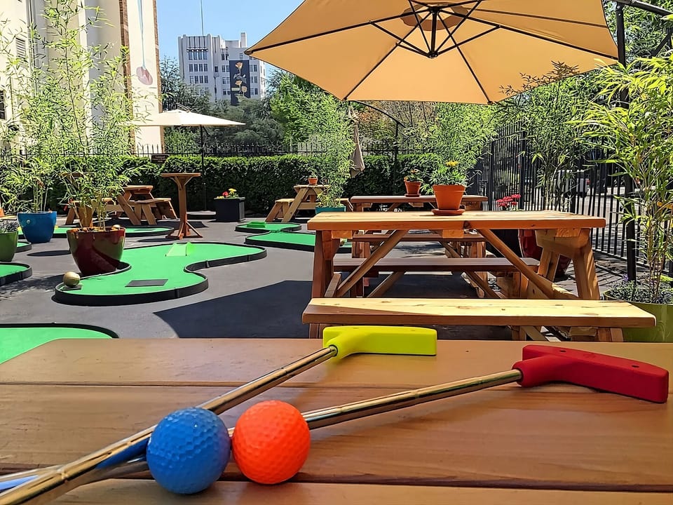 Play mini-golf outside, then linger at shaded picnic tables.