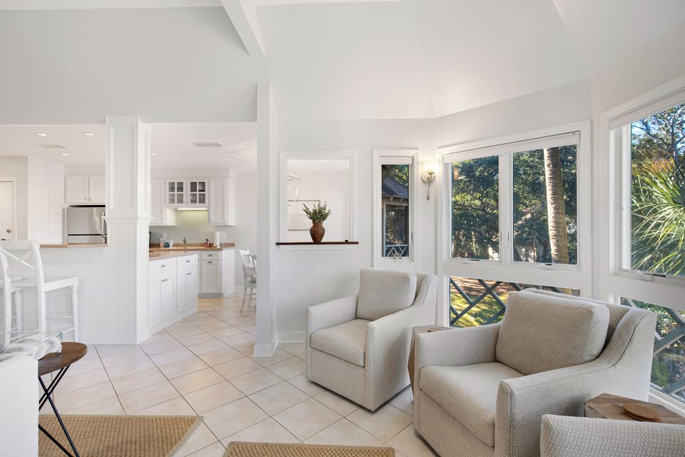 Sunny Sitting Area with Expansive Bay Windows