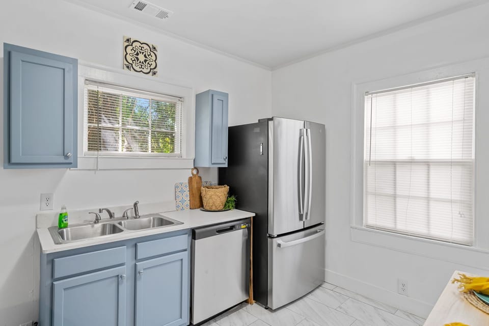 The kitchen with French doors stainless steel appliances for our special guest.