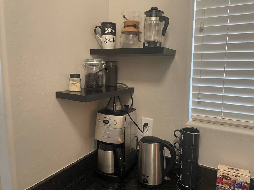 Coffee station…  Do you want traditional coffee maker?  Pour over? Or frenchpress? Starbucks coffee beans & grinder provided! Also a selection of teas. 
