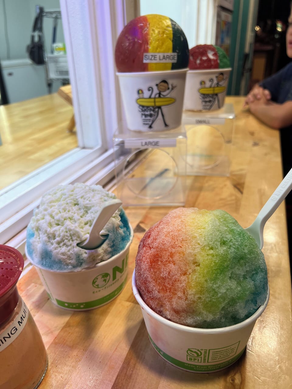 Walk to 4 different shave ice places.