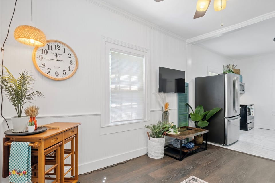 The open concept view from the living room facing the kitchen invites you.