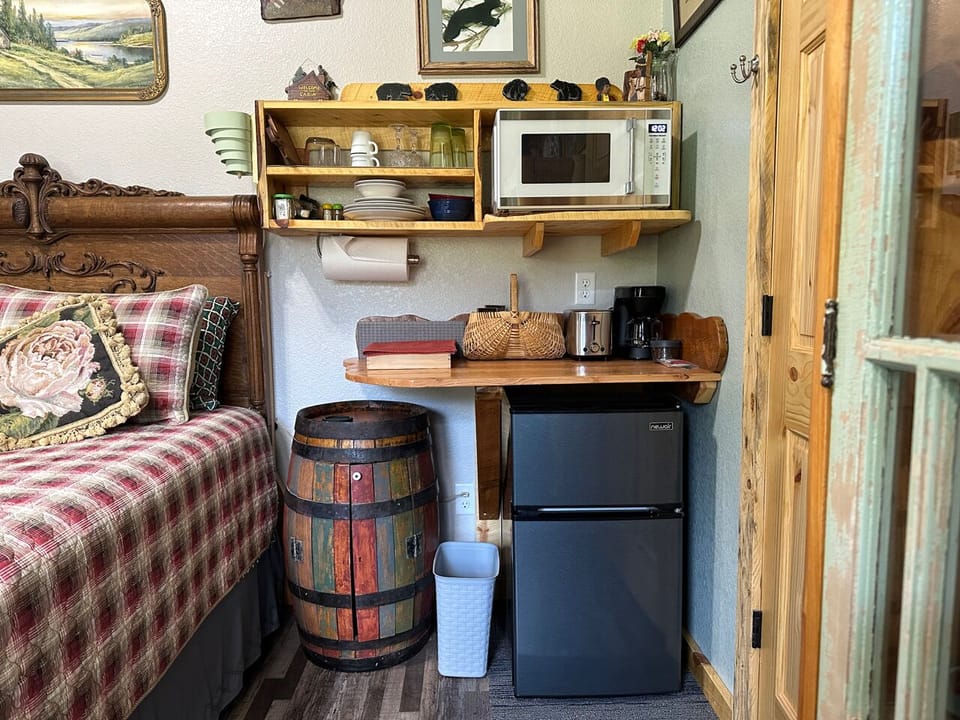 Kitchenette has microwave, coffee maker, toaster, utensils, fridge, pantry, etc.