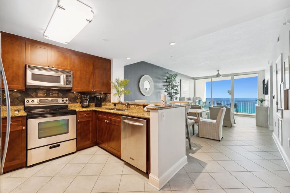 Gorgeous updated kitchen with stainless steel appliances.