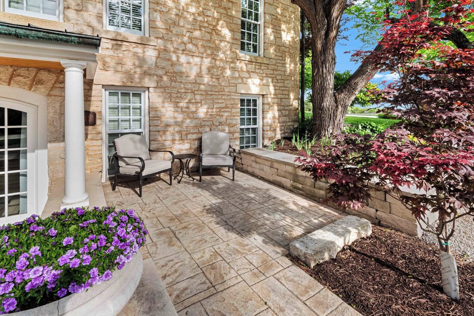 Outdoor seating area to enjoy the beautiful property grounds