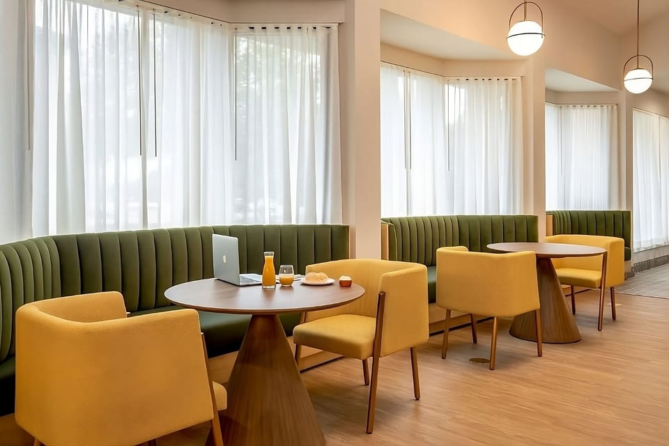 Start your morning with coffee in a bright seating nook.