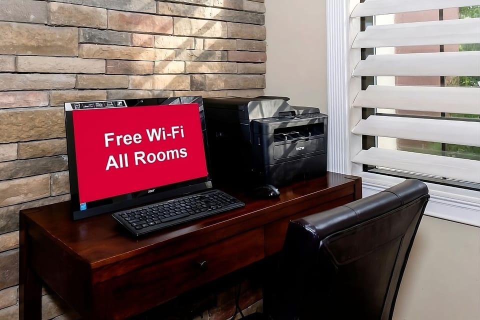 Catch up on emails comfortably in the quiet business corner.
