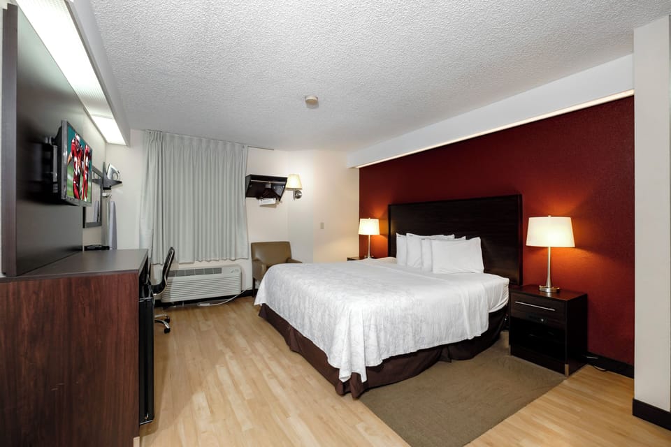 Sink into a plush king bed after a busy day.