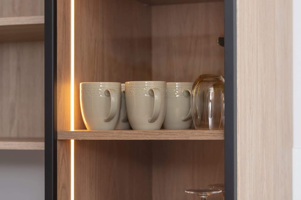 The living area's tasteful furnishings ensure a pleasant stay. 