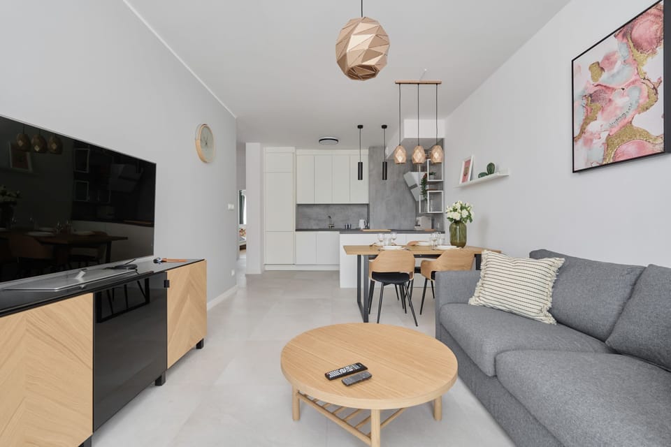 Enjoy your favorite shows on the flat-screen television in the elegant living area.