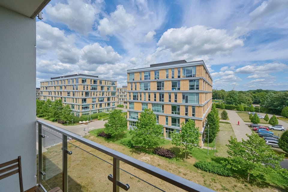 The balcony provides a perfect spot for enjoying the fresh air. 