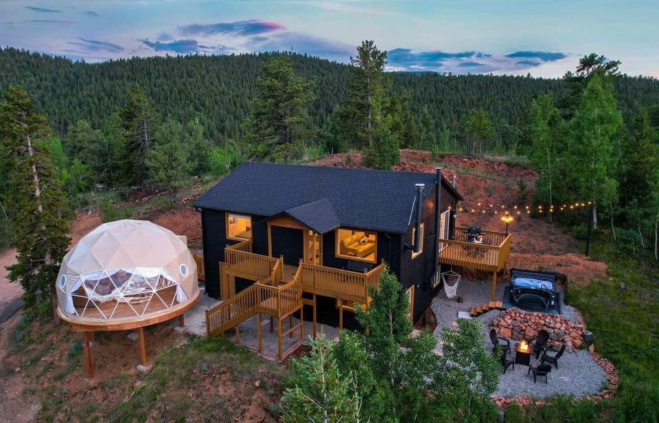 Geo Dome Movie Theater & Yoga Studio with Hot Tub, Fire Table, Fireplaces, Outdoor Dining, Grilling, 3 Bedrooms, Work Desk, 2 Living rooms and more to enjoy.