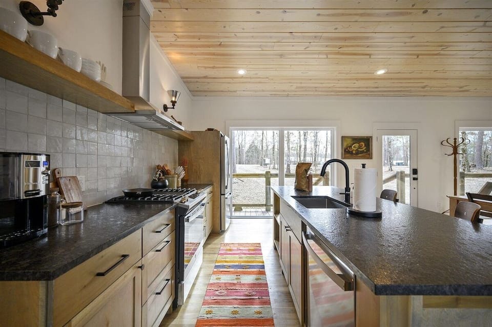 Chef's Kitchen: Cook up a feast with modern appliances and a stunning view of nature!