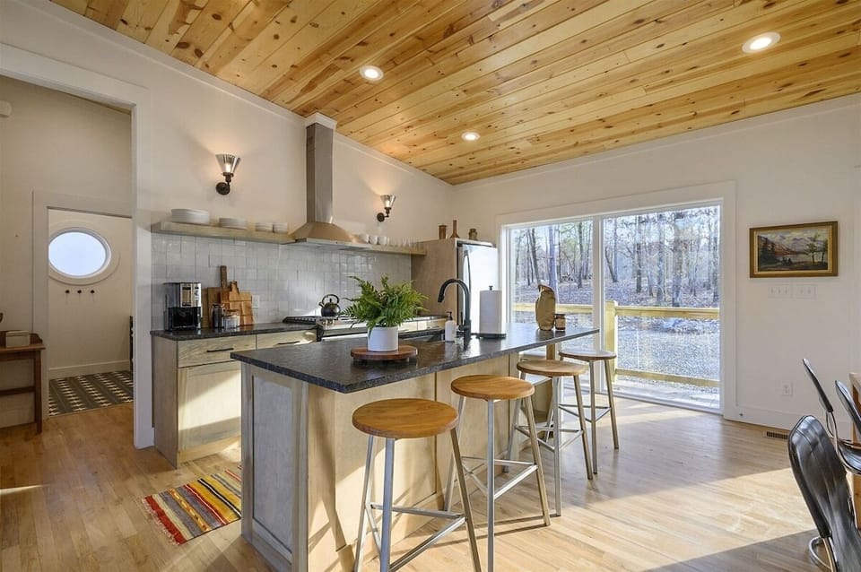 Kitchen: Bright space with rustic charm, perfect for culinary adventures and gathering cheer!