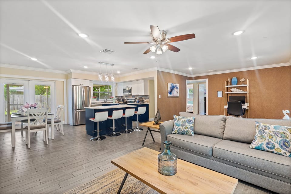 Another view of the dining area, living room and kitchen.