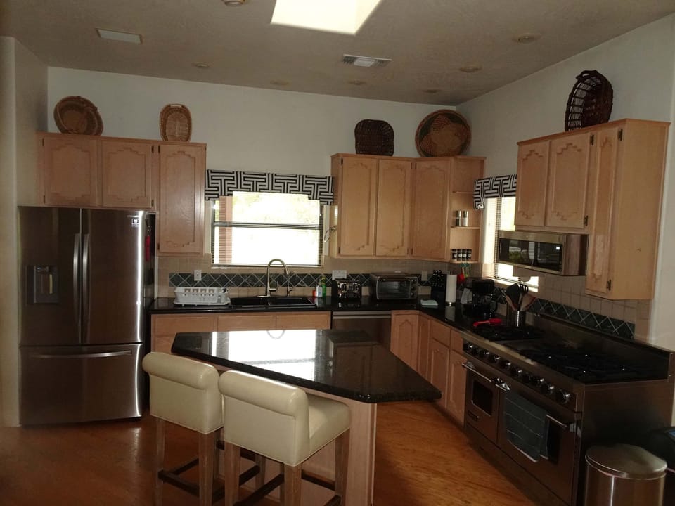 Kitchen appliances and island overview (12 of 35)