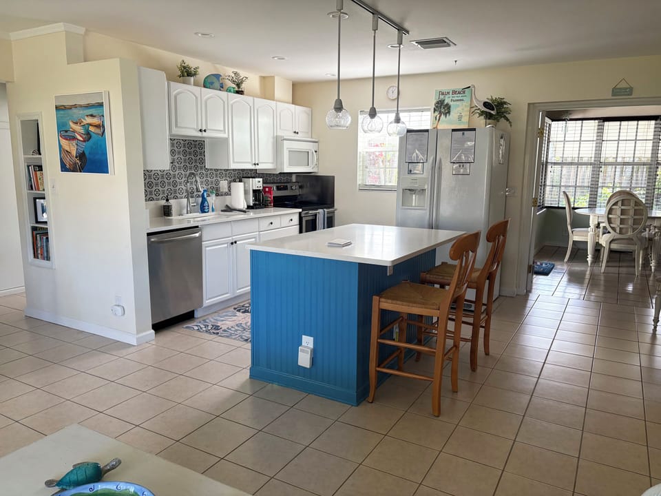 Open kitchen/living area designed for easy movement. 