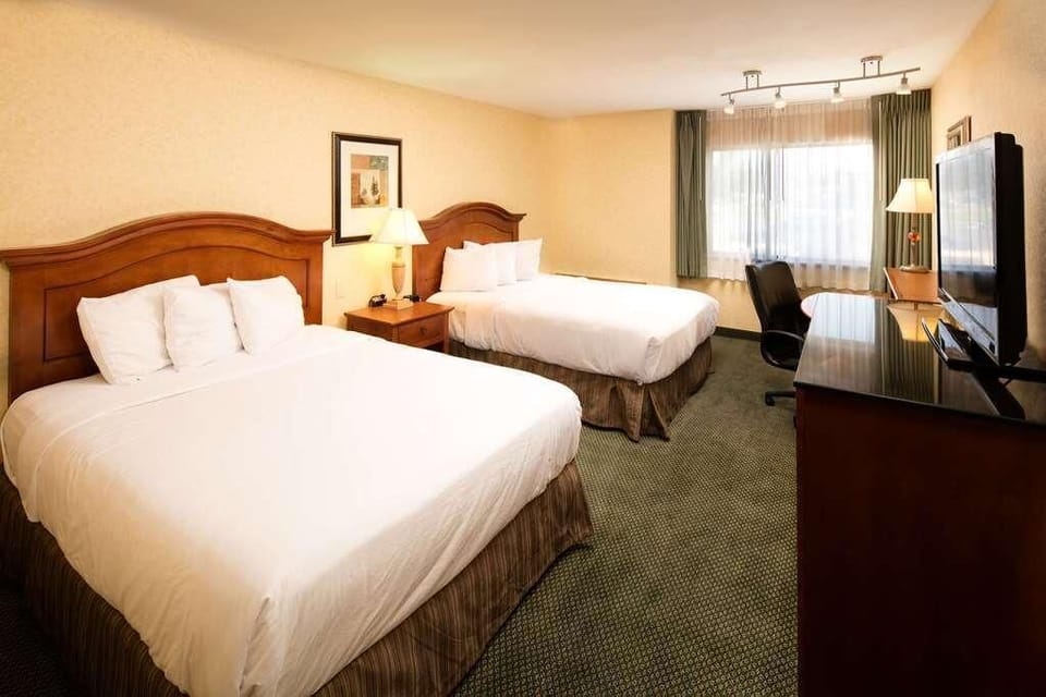 Stretch out comfortably with two queen beds and crisp linens.