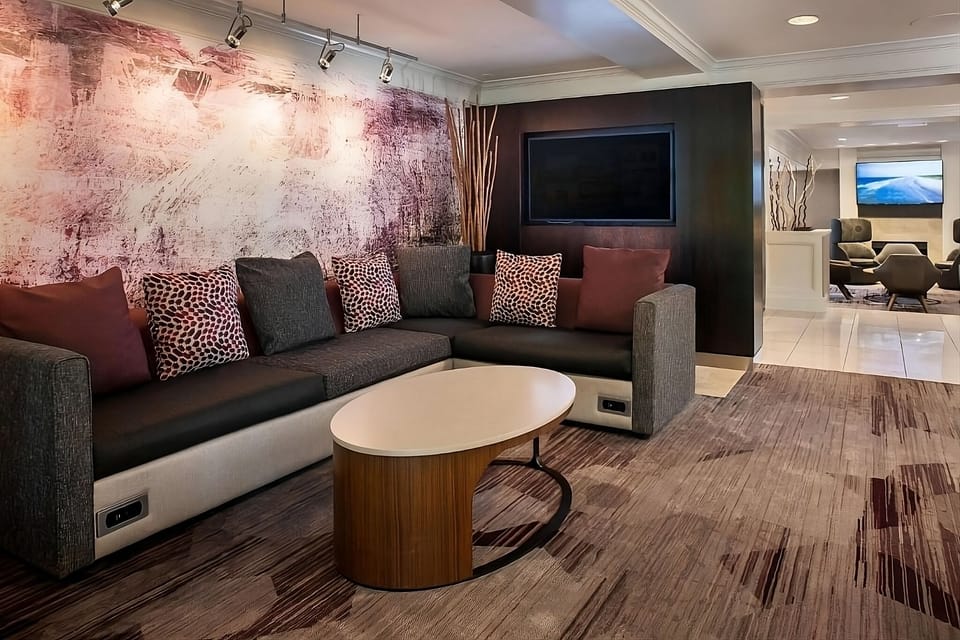 Kick back on plush seating in the calm, modern lounge.