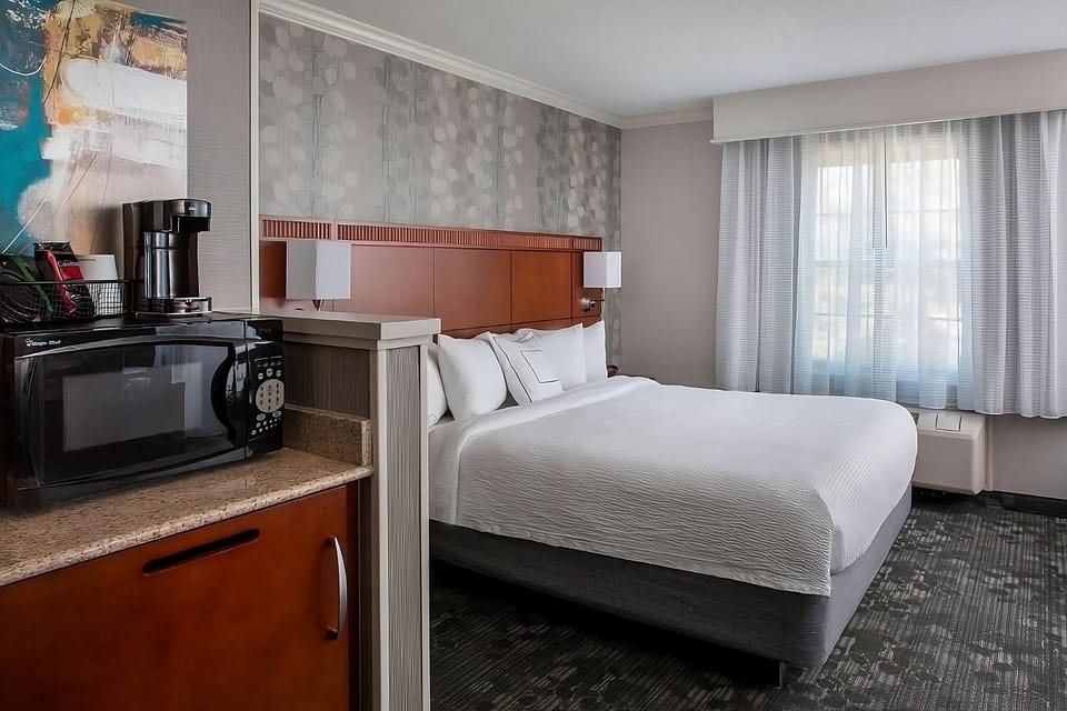 Start mornings with in-room coffee and quick snack prep.