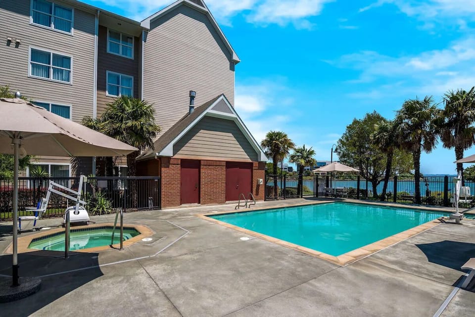 Dive into sunny pool days with loungers and shade.