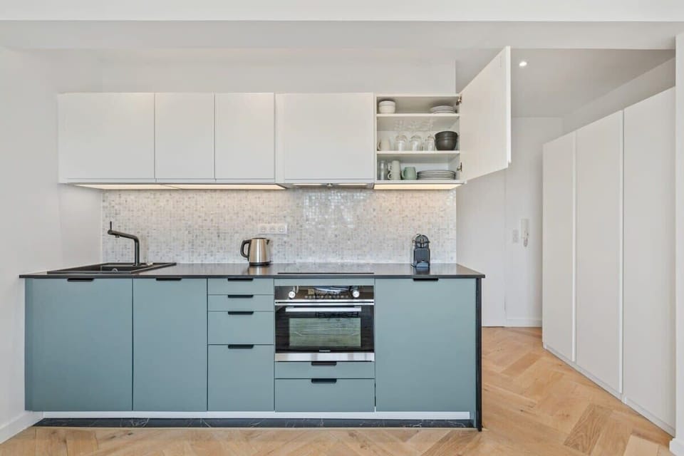Cook in style with our sleek, modern kitchen amenities—bon appétit!