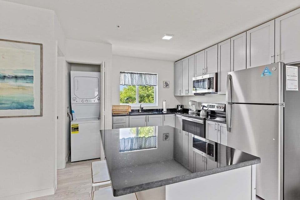 In unit washer and dryer for your convenience.