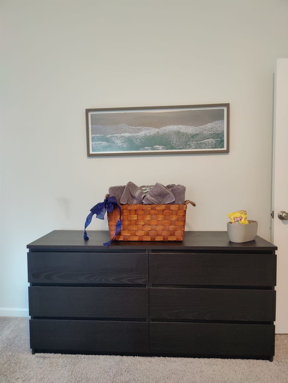 dresser with top row drawers in main bedroom