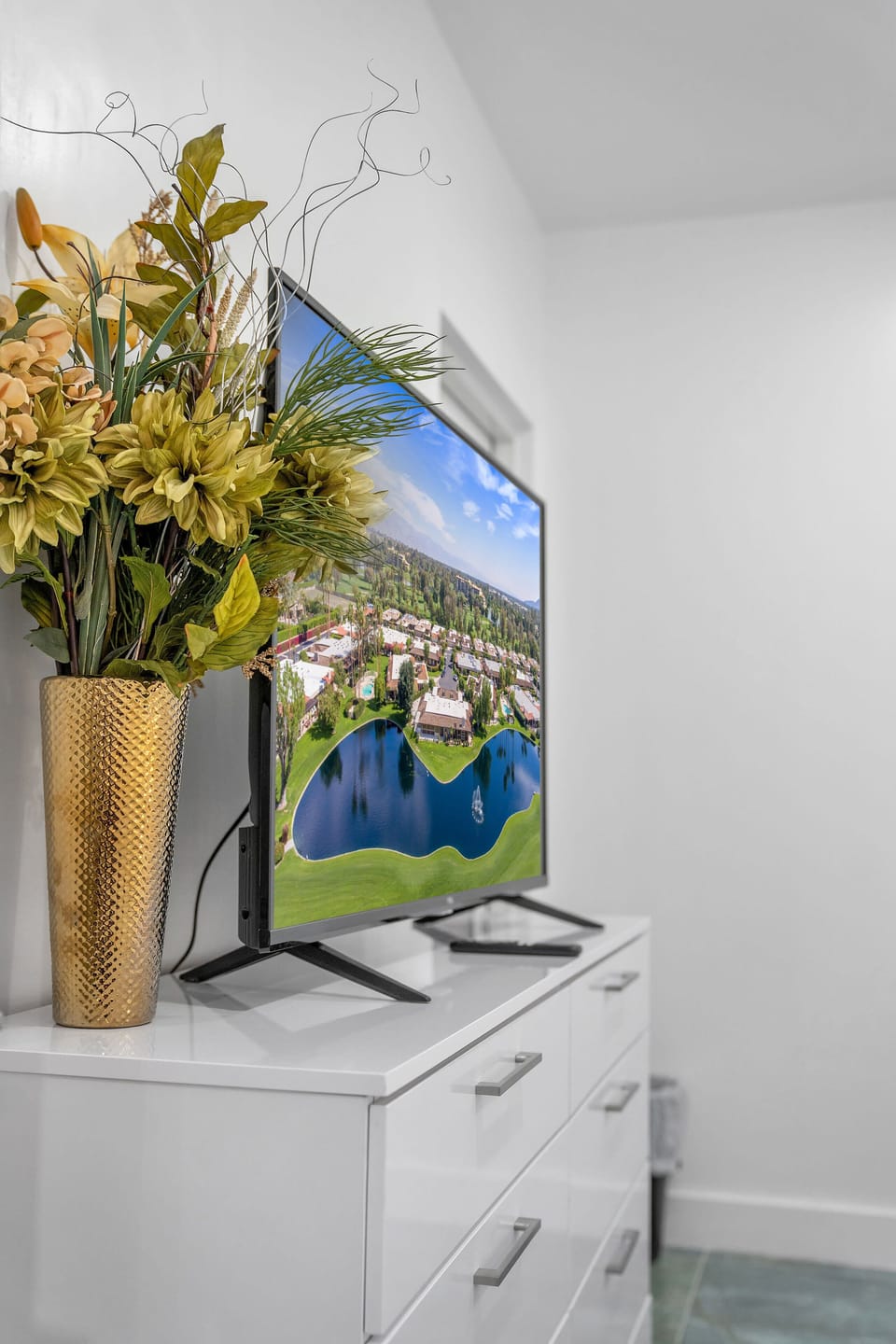 Enjoy the comfort of the living space, featuring plush seating, adaptable lighting, and a wide-screen TV for streaming all your favorite content.