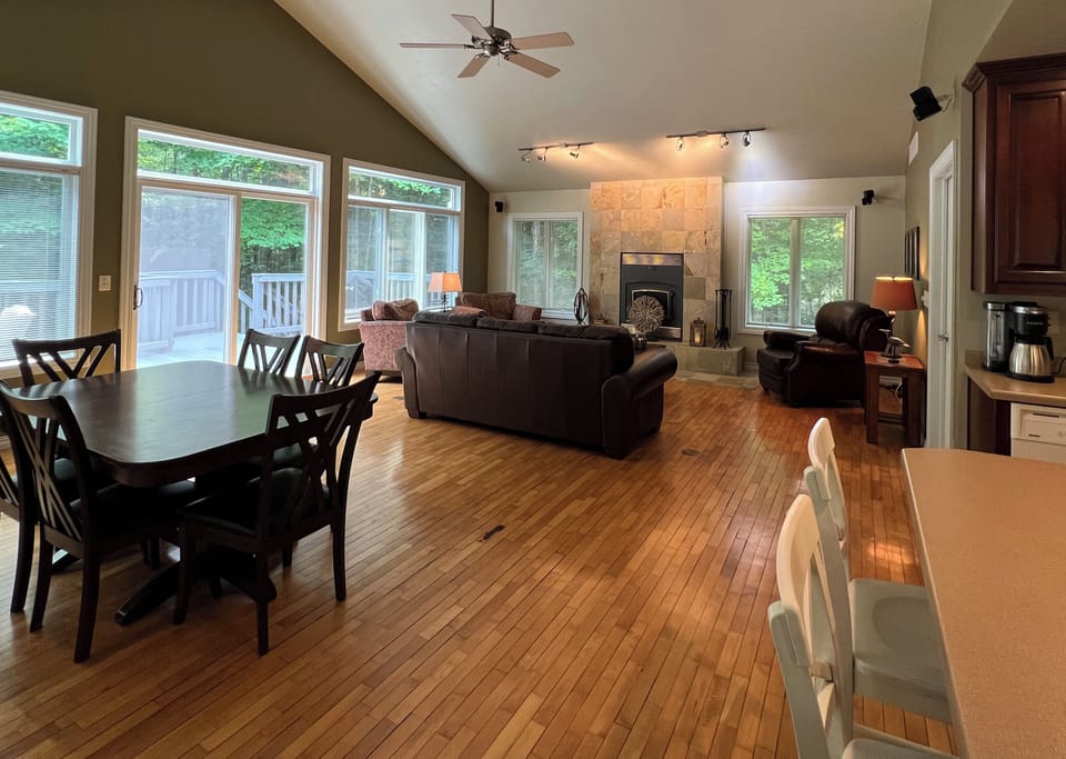 Open concept floor plan connects kitchen, dining and living rooms.