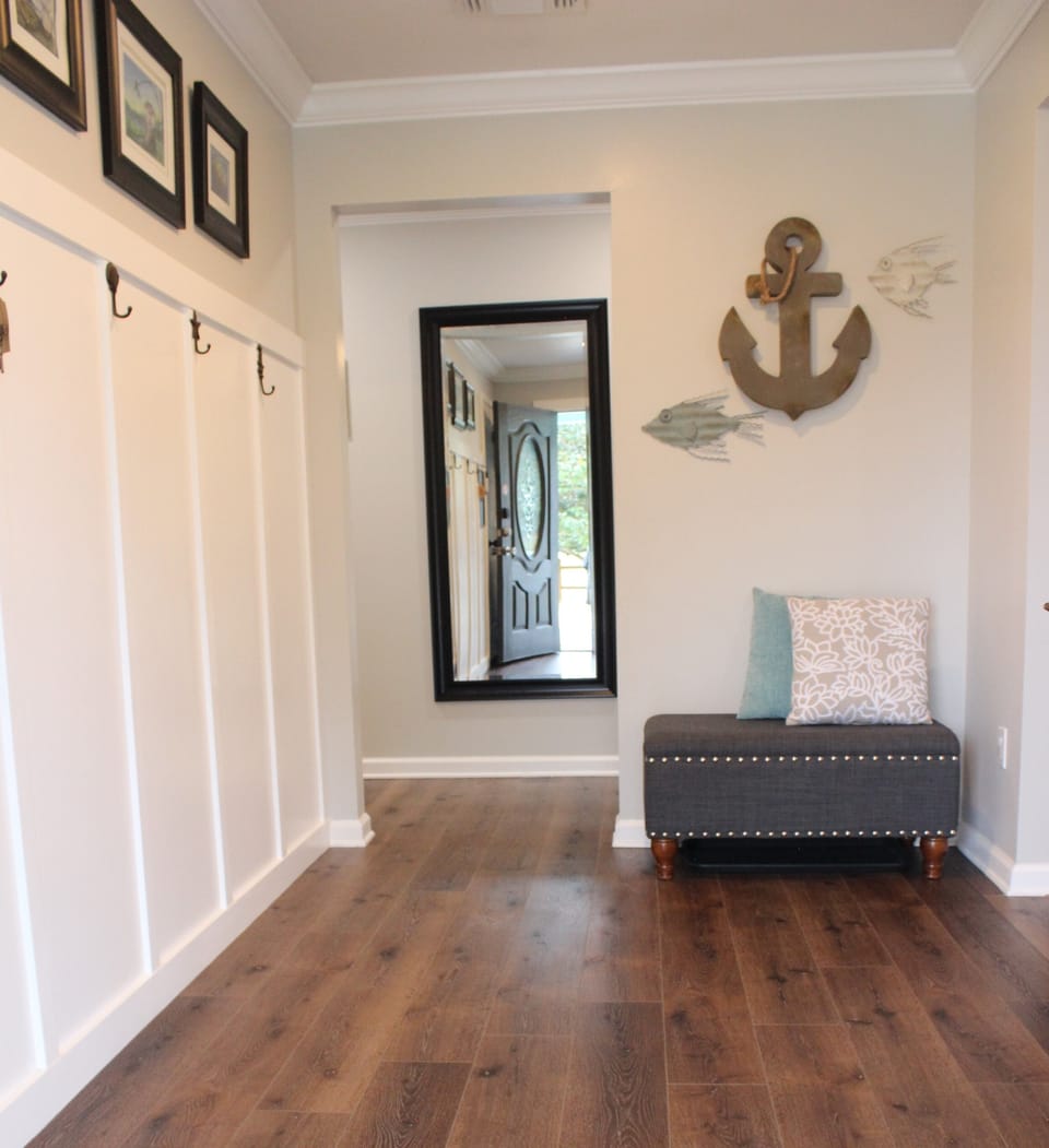Welcome entryway. Closet has beach chairs, sand pails and a drink cooler.