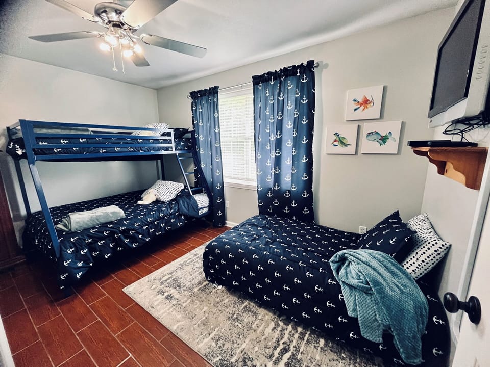 Bunk bed; twin on top, full in bottom. Futon bed for children.