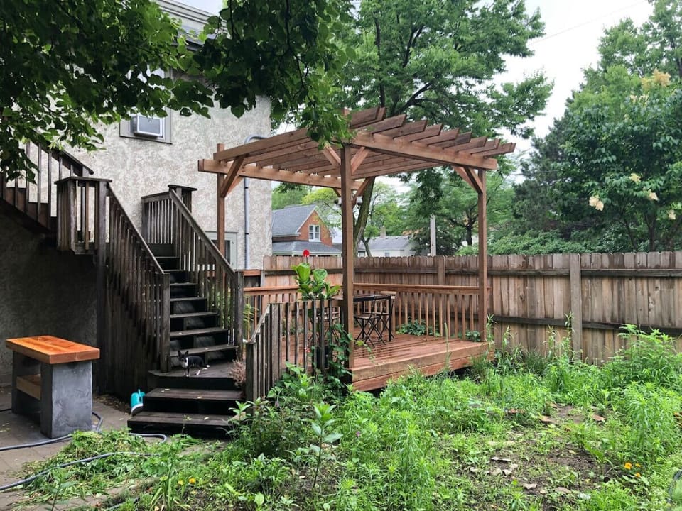 Private backyard with deck, sauna, and firepit