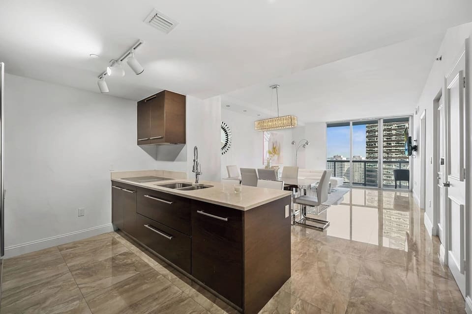 Fully equipped kitchen and dining table with a view