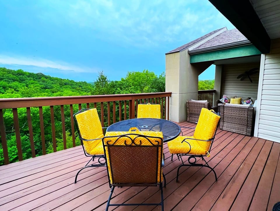 Relax and soak up the breathtaking view of the lake from the comfort of your outdoor seating area