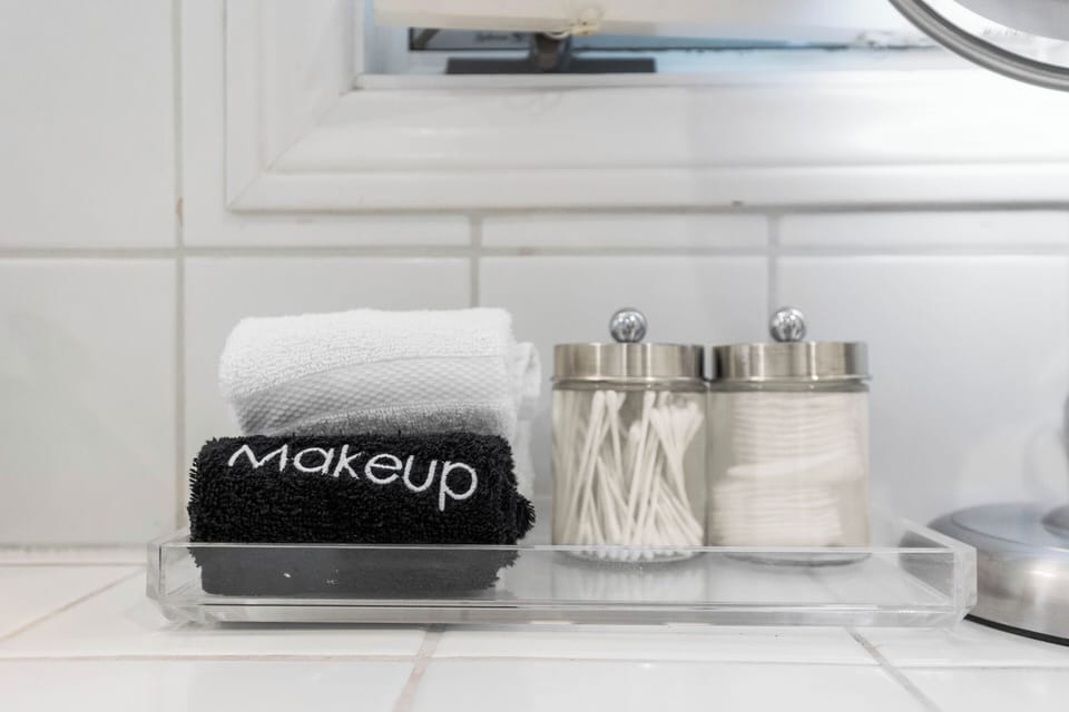 Bathroom Amenities: Makeup washcloths, Cotton rounds, and Q-tips