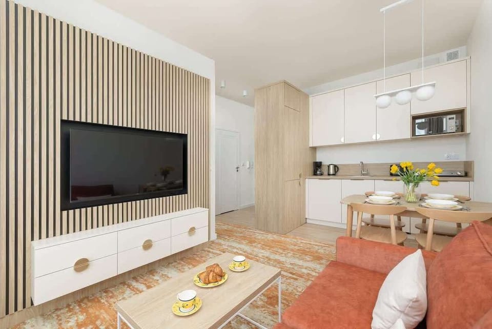 Living room with dining table and chairs.