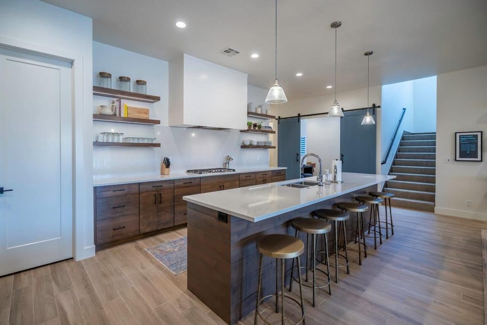 Expansive kitchen with large island seating for 6 people