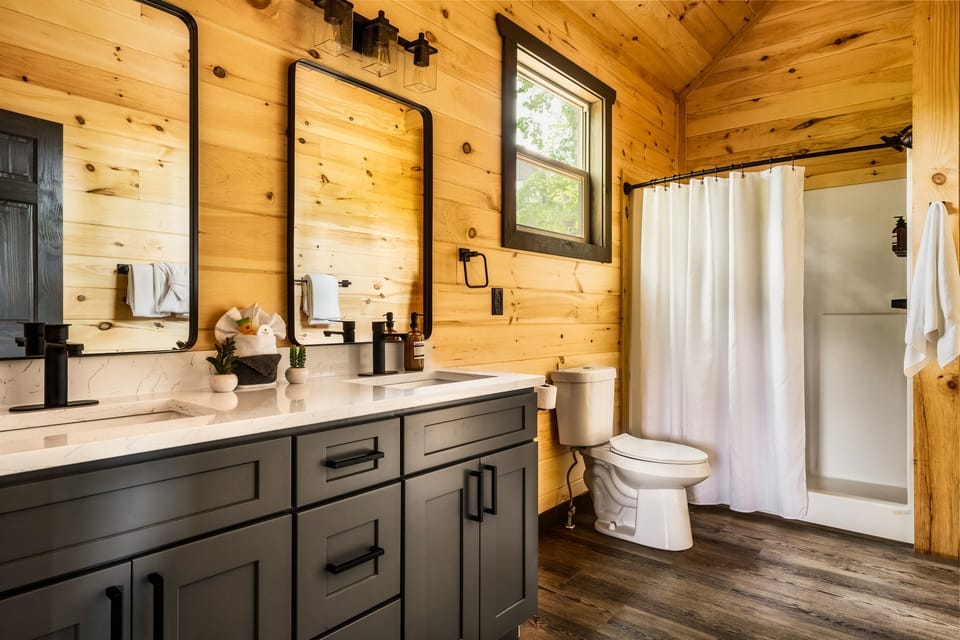 Master bedroom is connected to a full en suite master bathroom with shower.