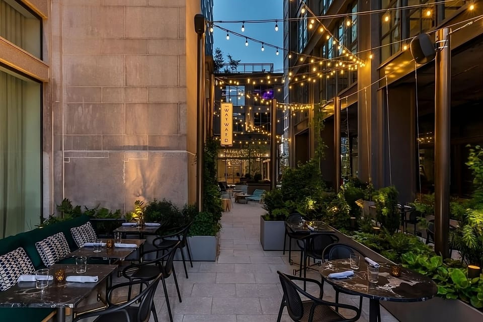 Sip cocktails under twinkle lights in the cozy courtyard.