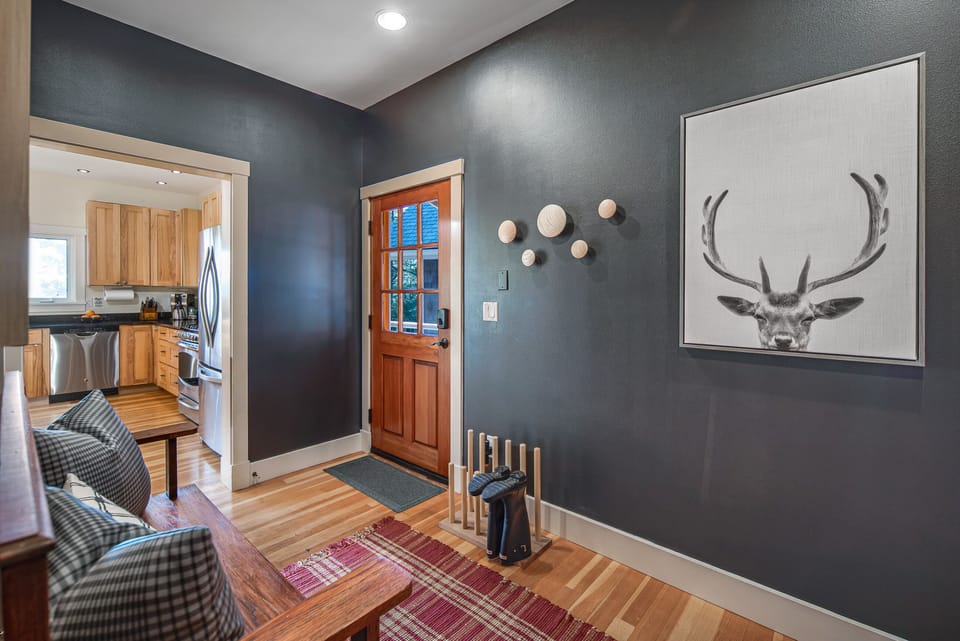 Enter the house to a mudroom which 
 contains the pantry, Washer/dryer, etc.